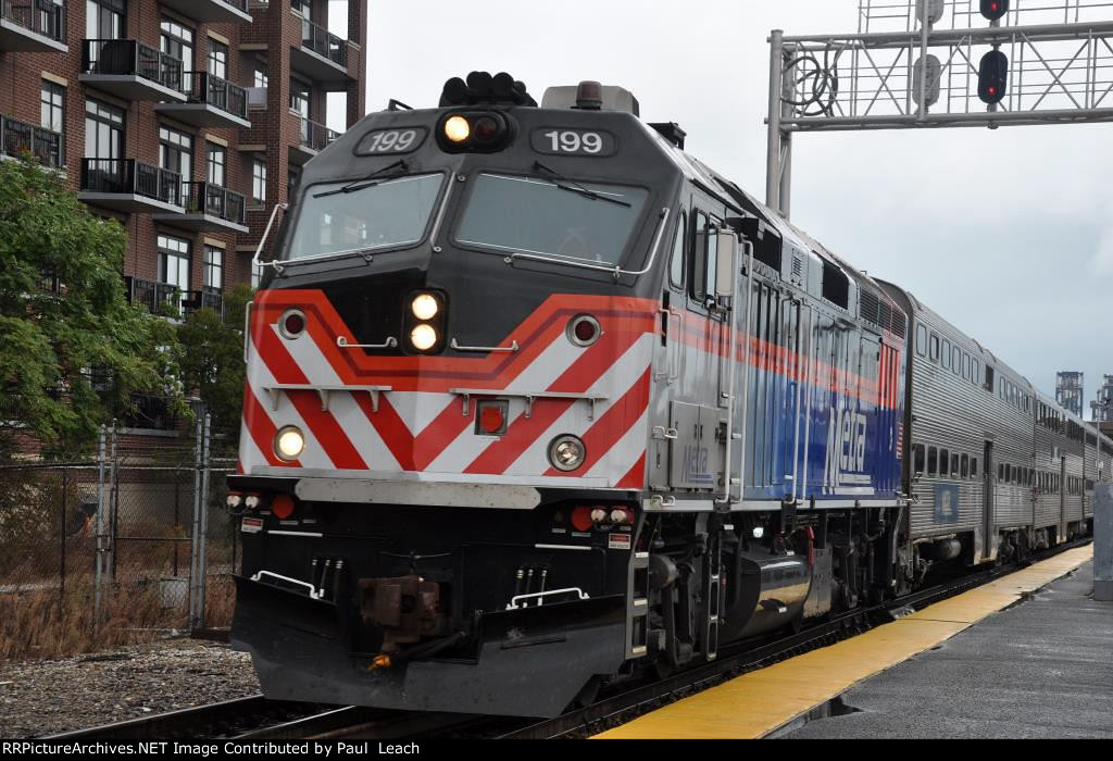 Outbound commuter approaches the station